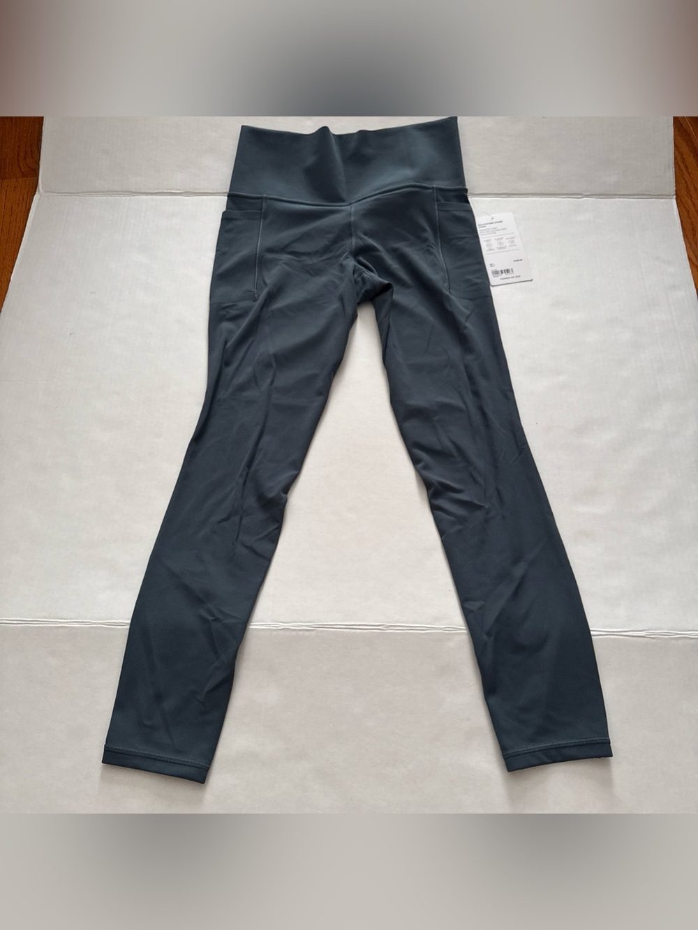 Athleta Stash Pocket Salutation Blue Leggings Tight Womens Small NWT